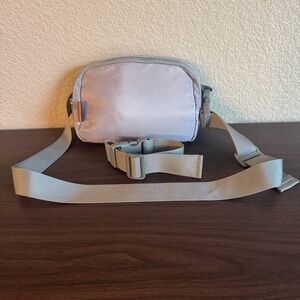 Latched Mama Light Gray Crossbody Belt Bag